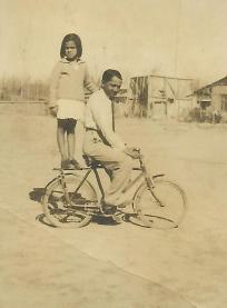 meena-and-mr-parekh-on-the-cycle-2